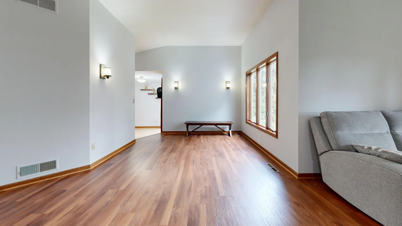 Bright interior showing baseboard and floor transitions
